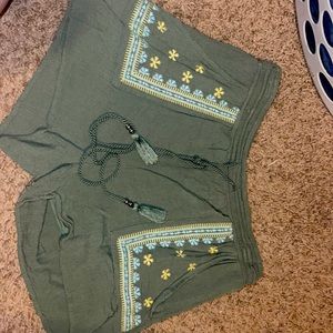 Green summer shorts with embroidery